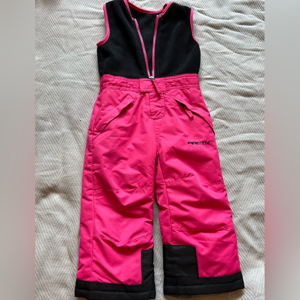 Girls Arctix snow bibs.